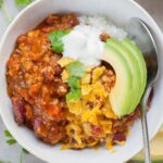 Turkey pumpkin chili in a white bowl.