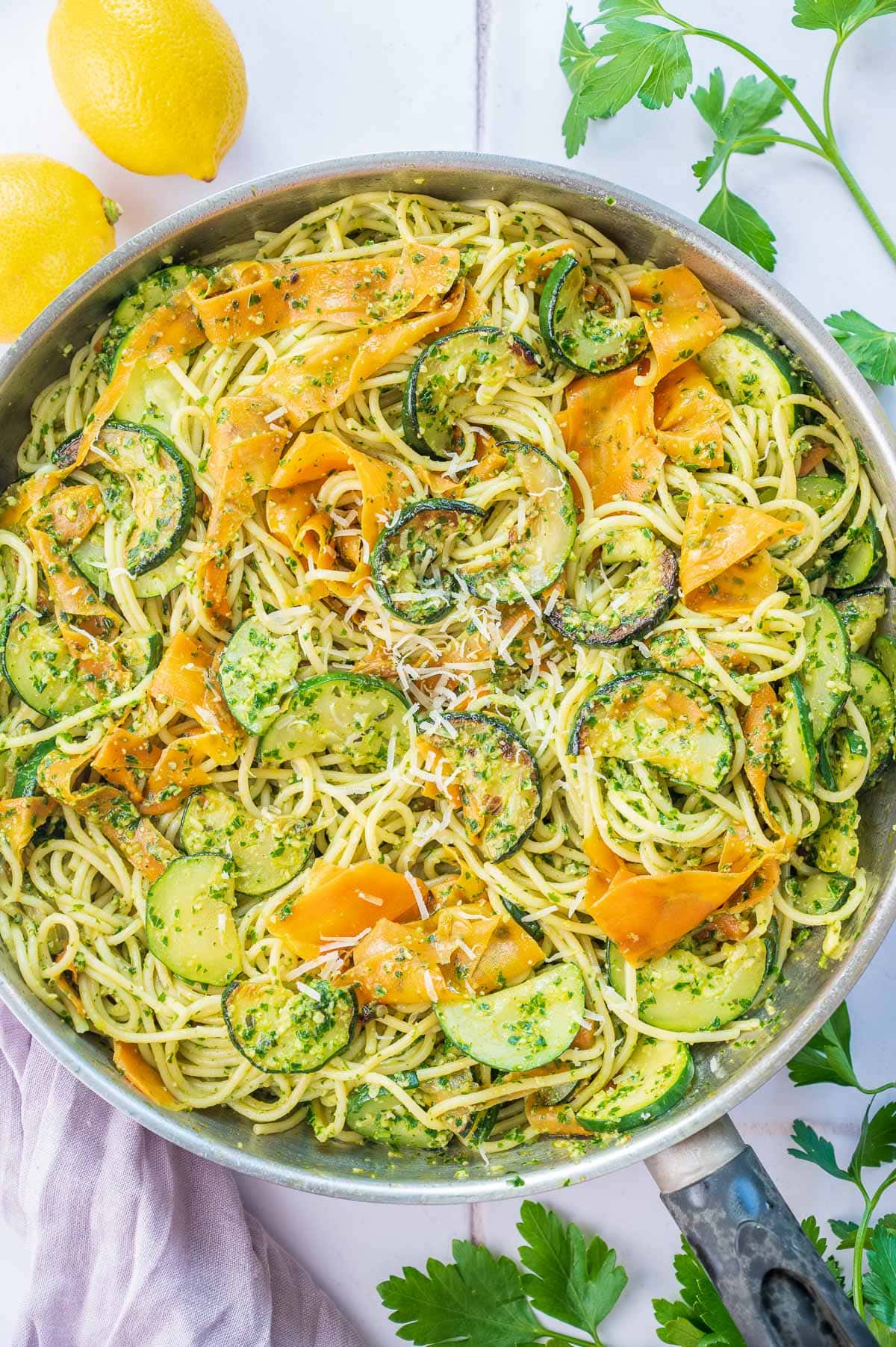 Parsley pesto pasta in a frying pan.